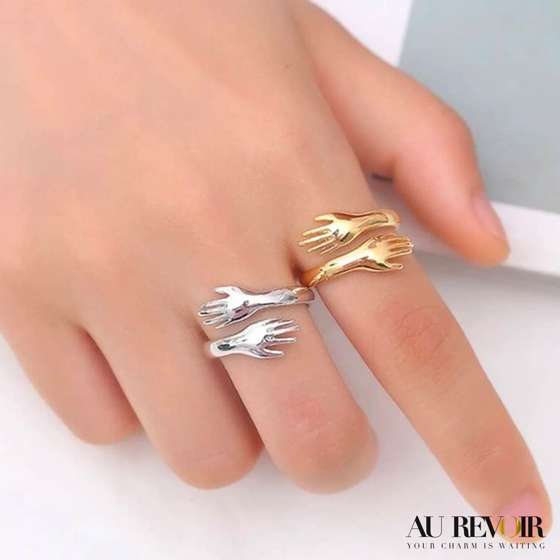 Holding hand custom gold and silver ring